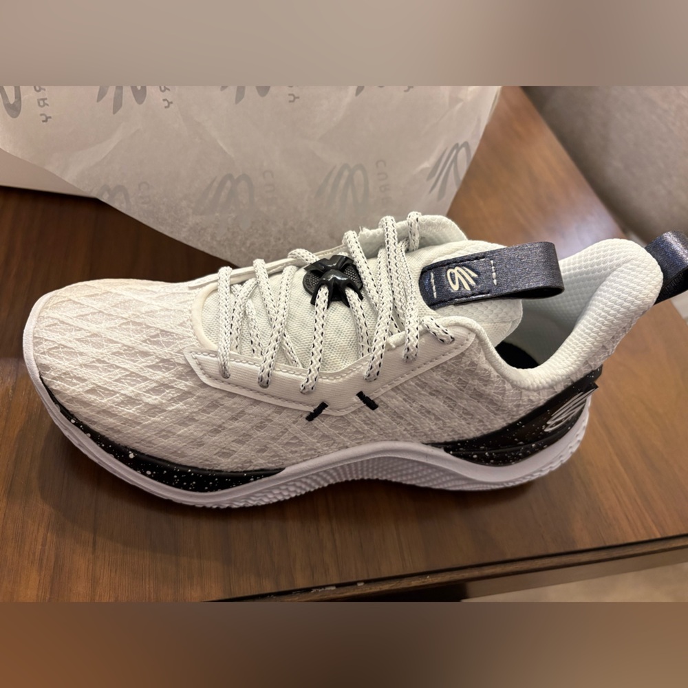 Under Armor White and Black Men’s Basketball Shoe